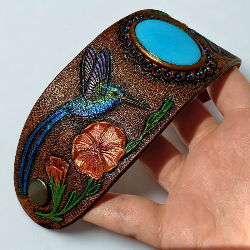 Tooled leather hummingbird bracelet with turquoise cabochon