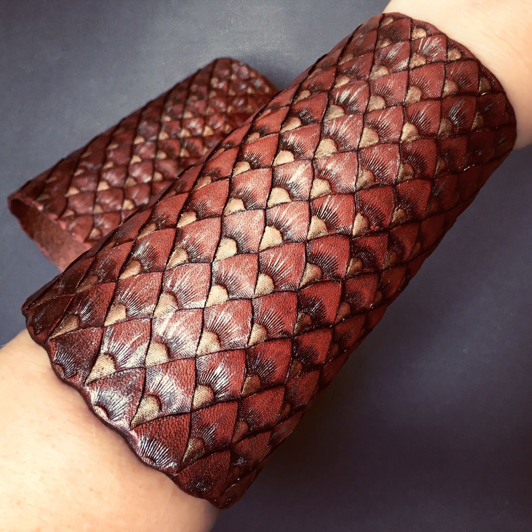 Tooled leather Dragon skin bracers with iridescent sheen