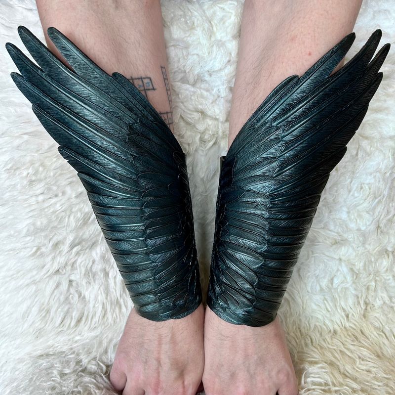 Pair of Tooled Leather Raven Wings Bracers with Metallic Sheen