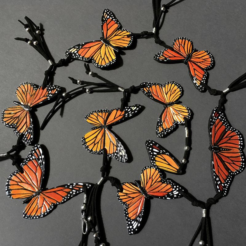 Exclusive tooled leather belt / necklace transformer with monarch butterflies