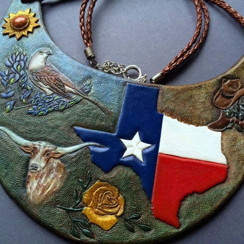 Tooled leather bib necklace with symbols of Texas