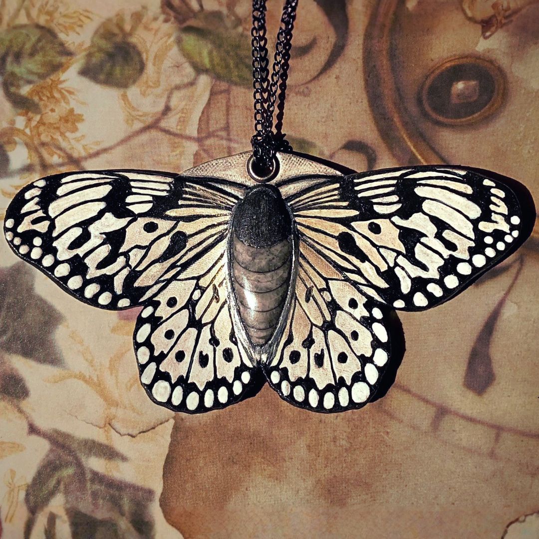 Tooled Leather Butterfly Pendant with Orthoceras Fossil