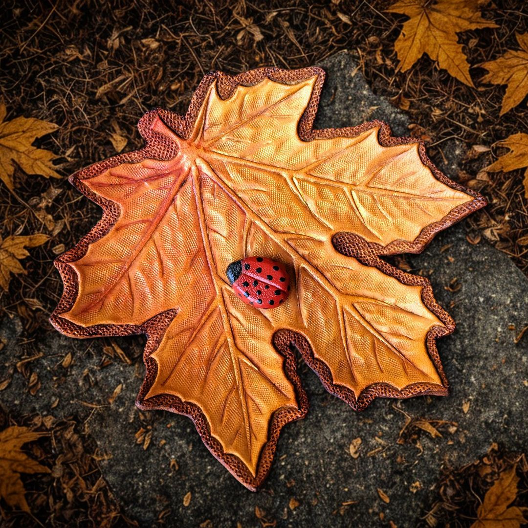 Tooled Leather Maple Leaf Brooch with a Ladybug