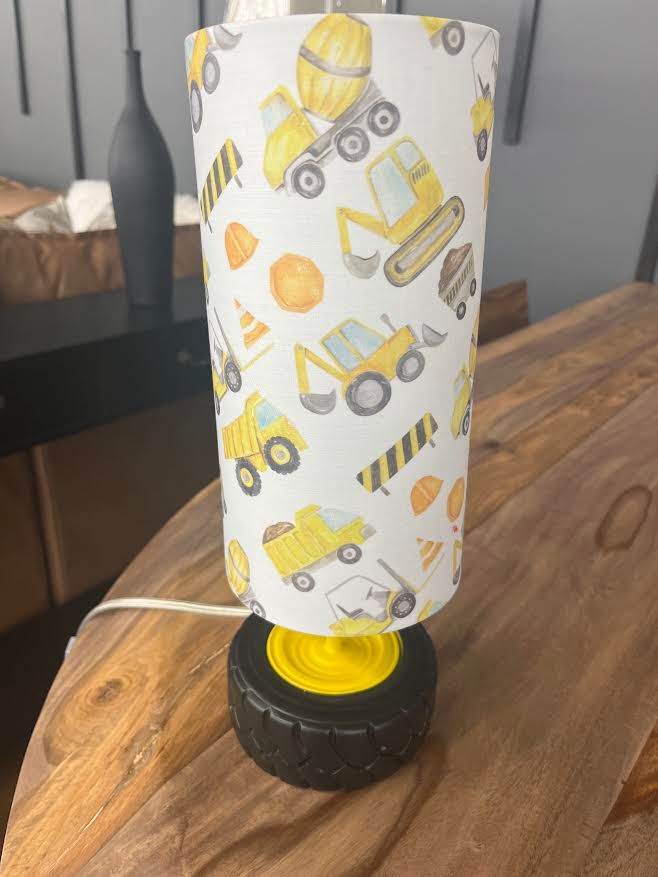 LAMP W/TIRE AND CONSTRUCTION TRUCKS