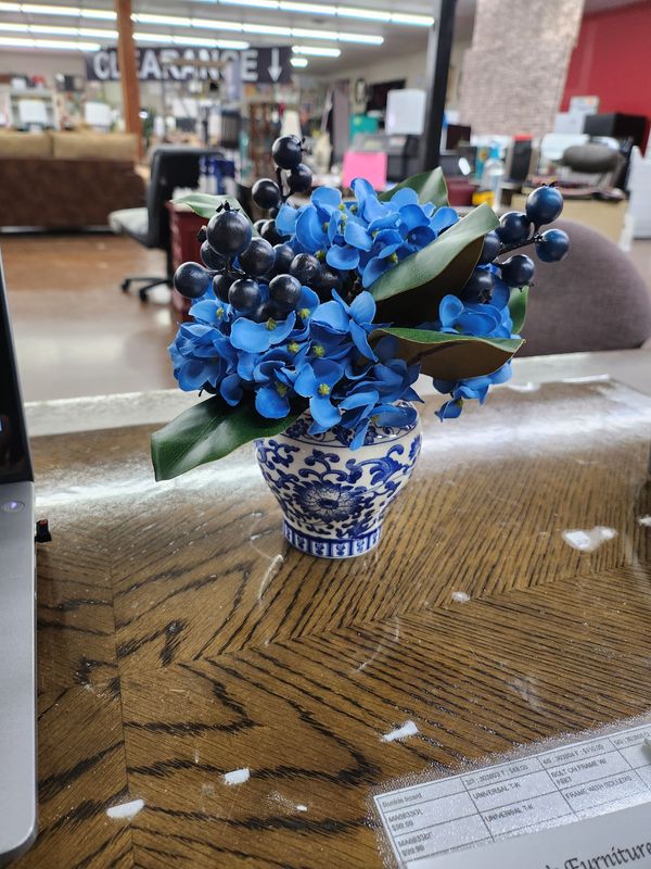 BLUE FLOWERS IN VASE