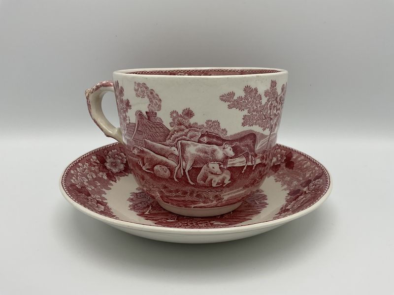 Ovrszd red Stafford cup and saucer