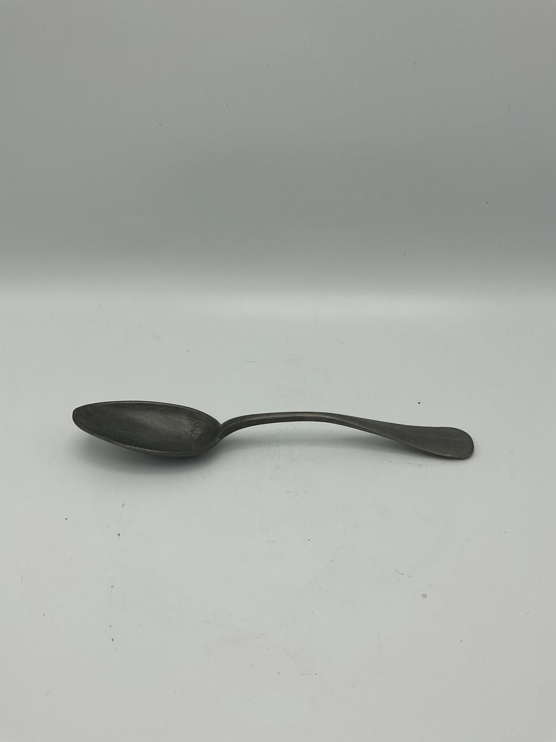 Antique Blackened Metal Spoon