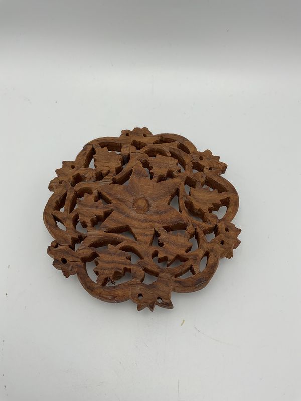 Hand carved wood trivet