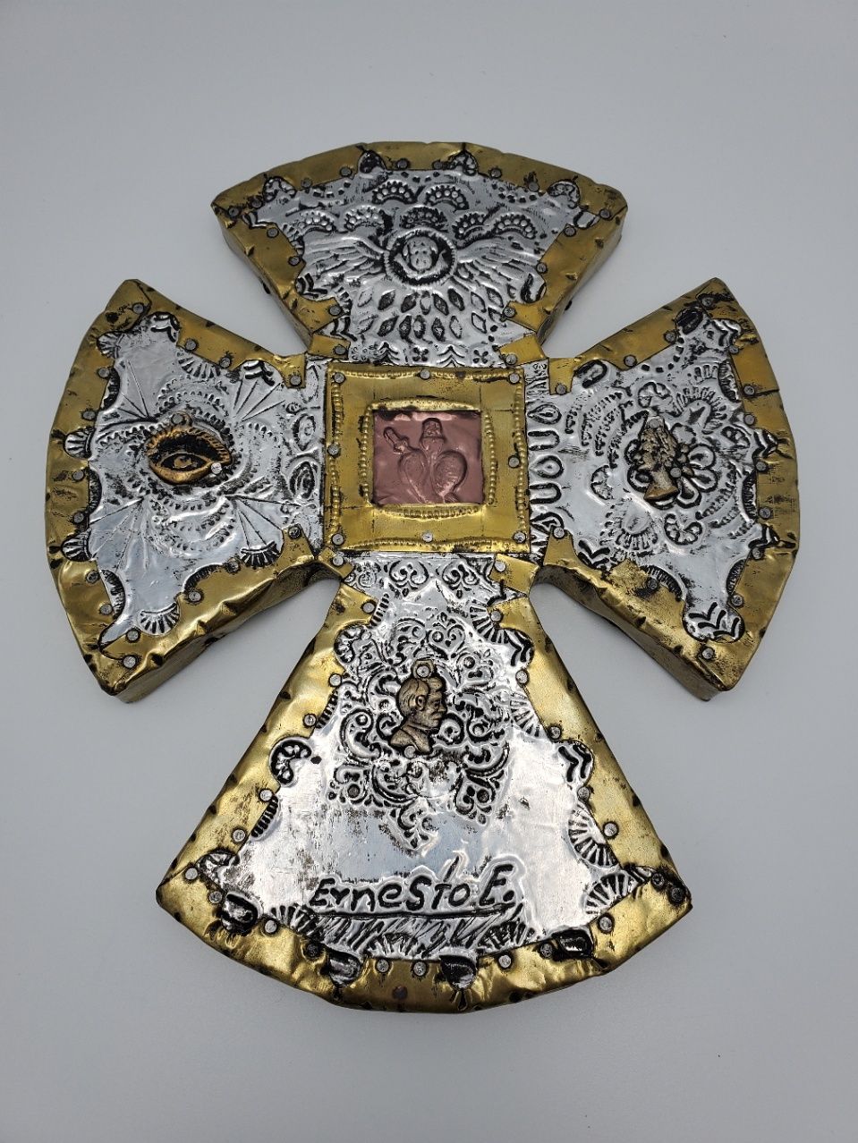 Ernesto E. milagro tin cross