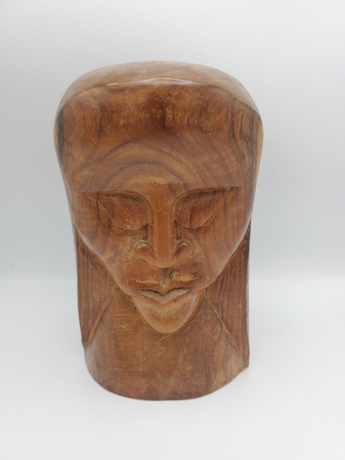 Tribal hand carved dark wood bust