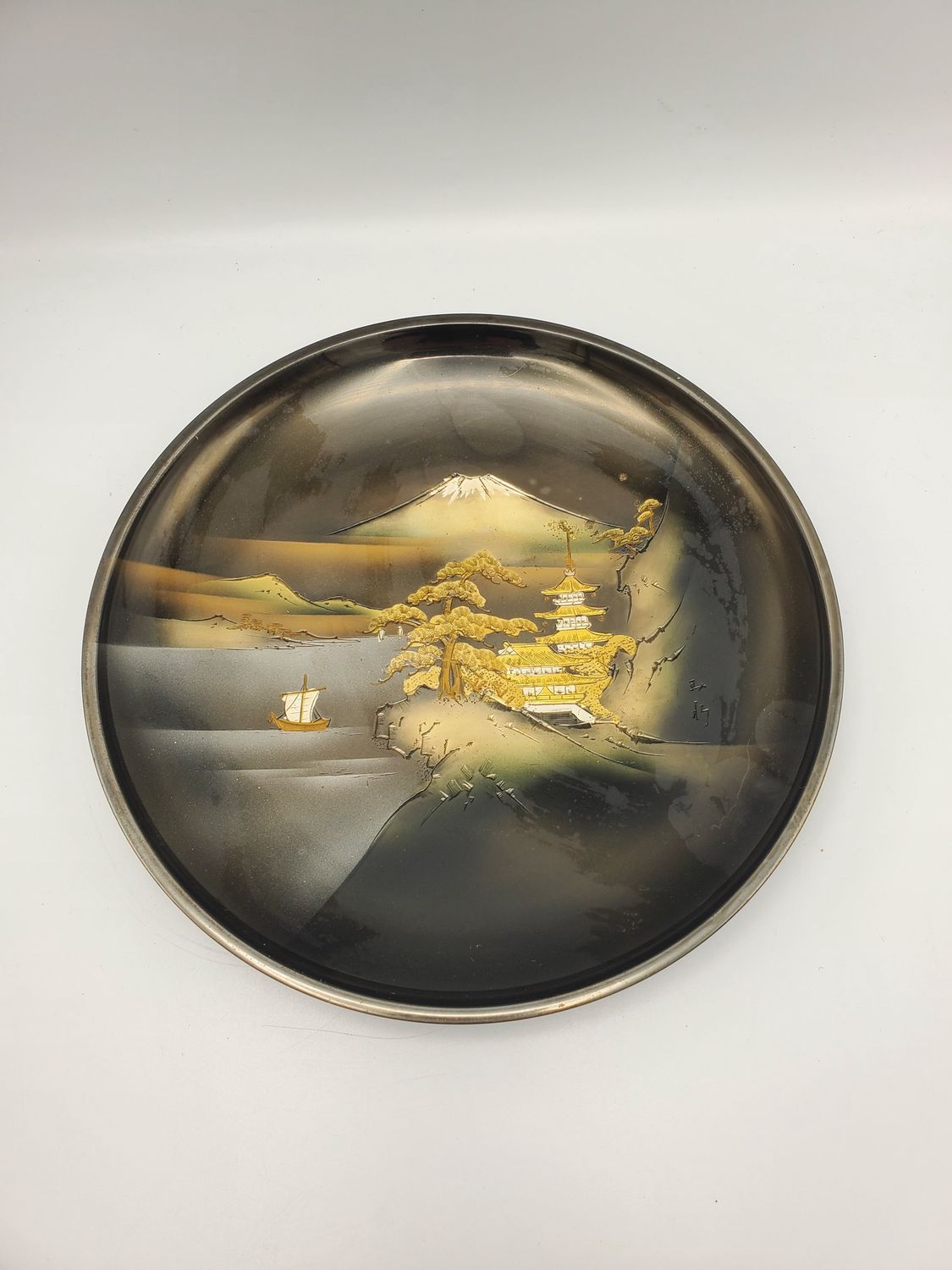 Mixed metal pagoda boat scene plate