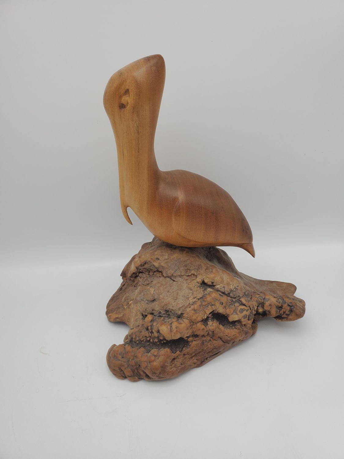 Pelican hand carved wood statue