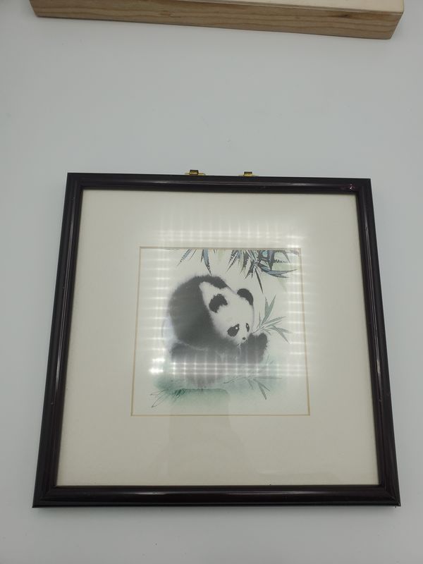 Panda watercolor framed, hunched over