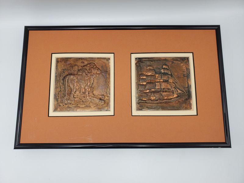 Copper lion and ship plate framed