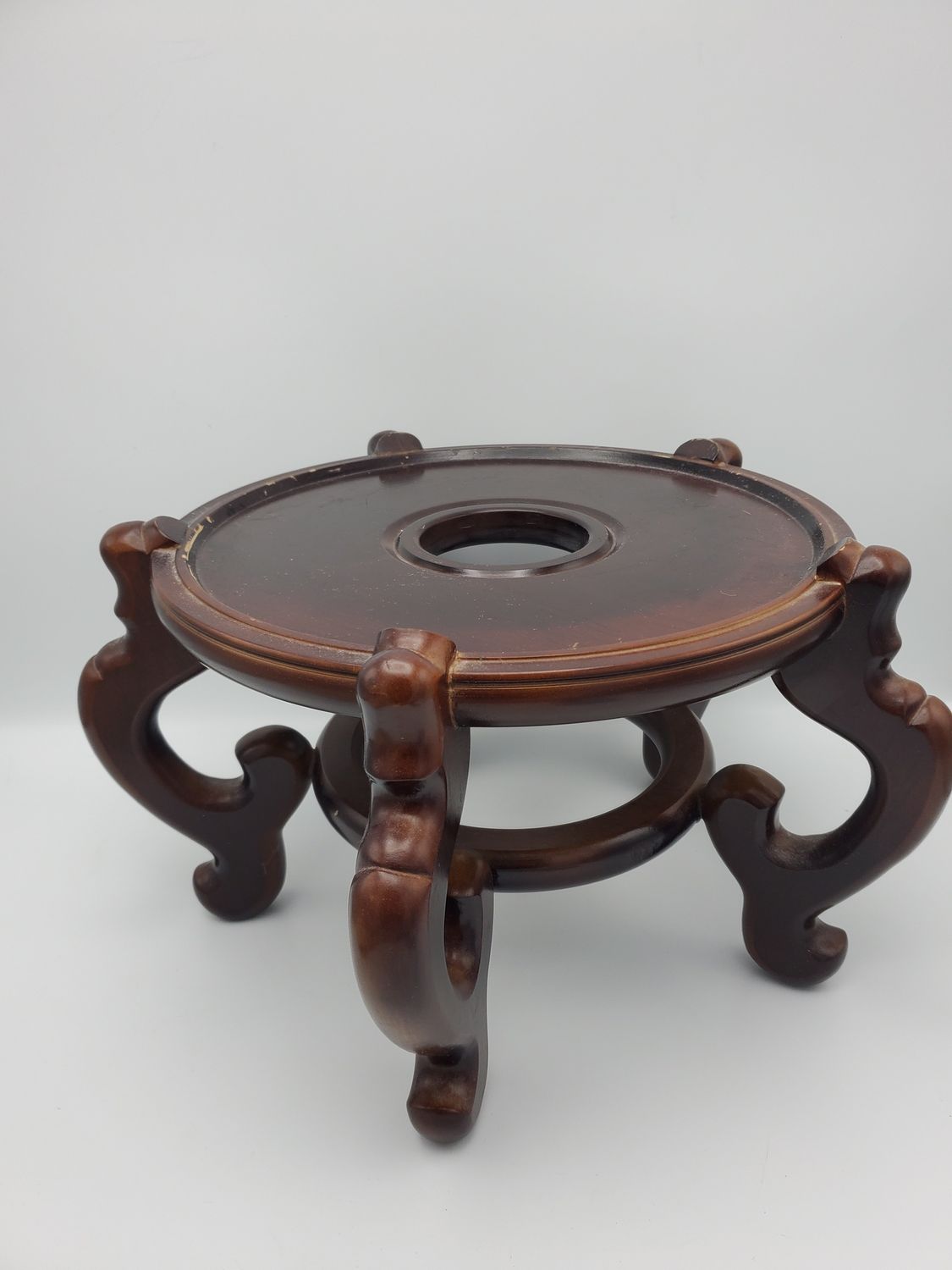 Carved wood plant stand