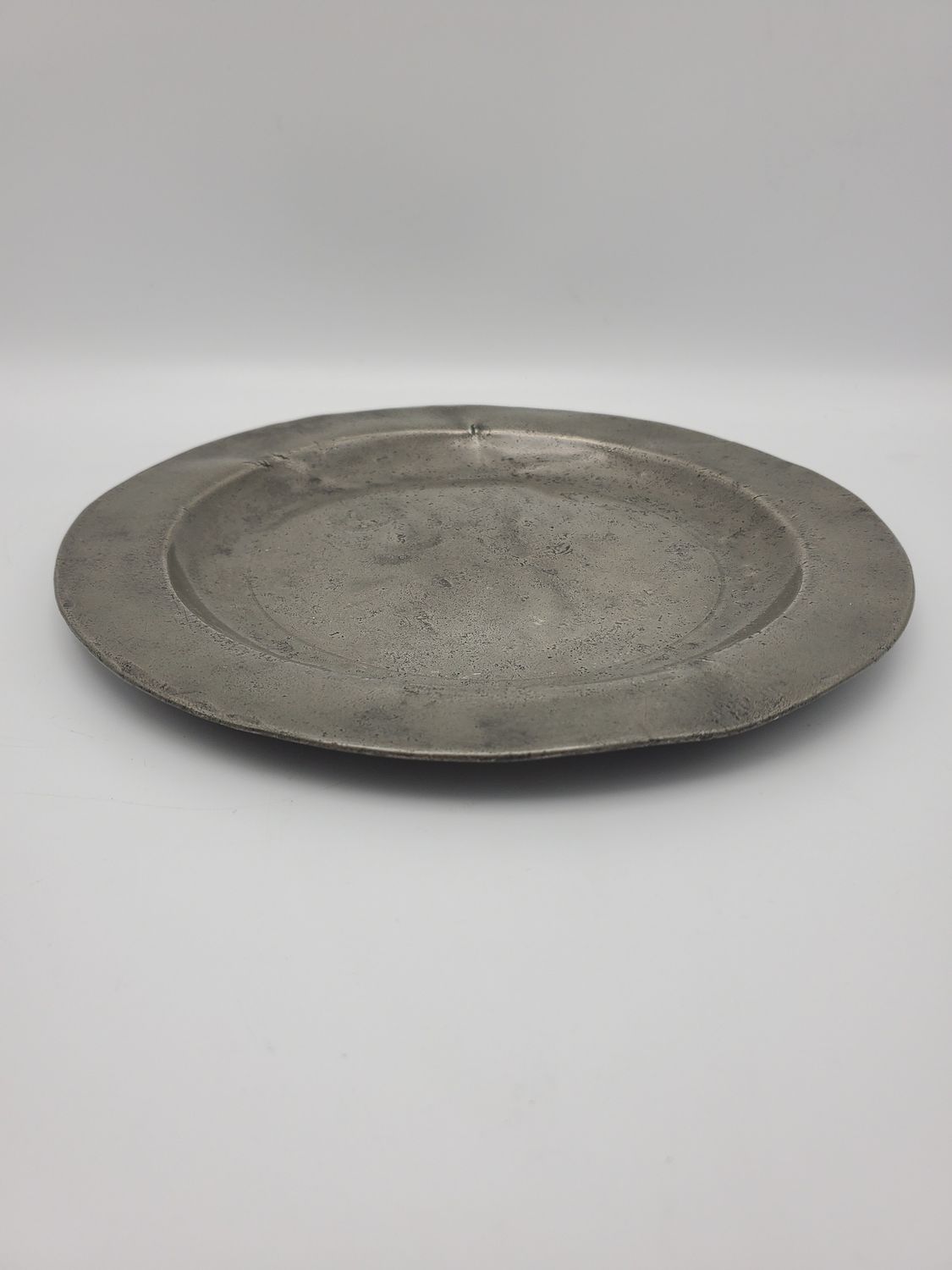 Pewter plate, 9 in.