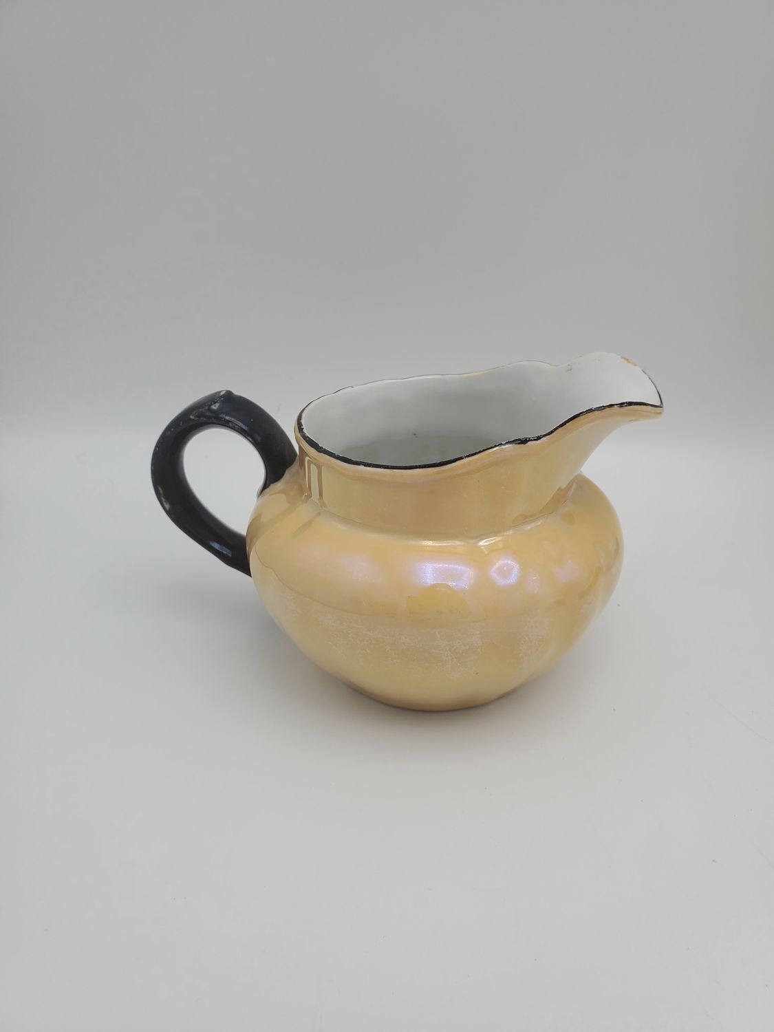 Peach lusterware creamer