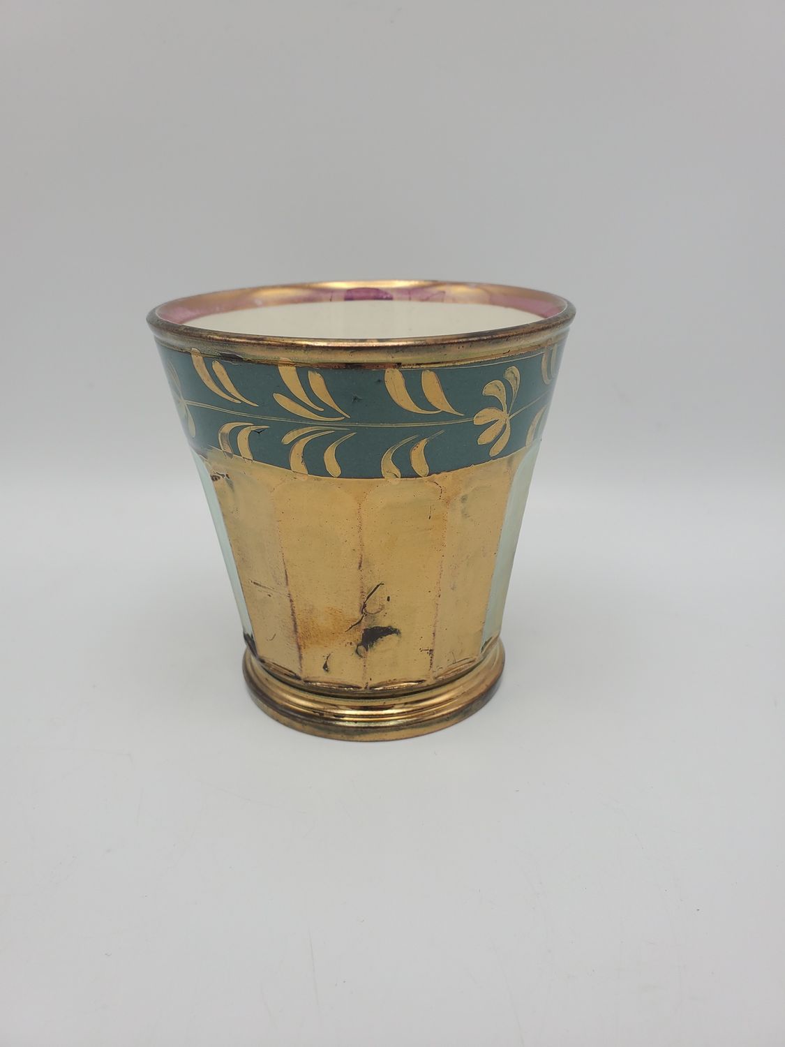 Copper lusterware top blue leaf cup