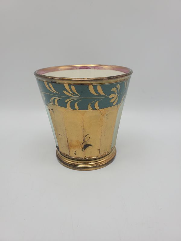 Copper lusterware top blue leaf cup