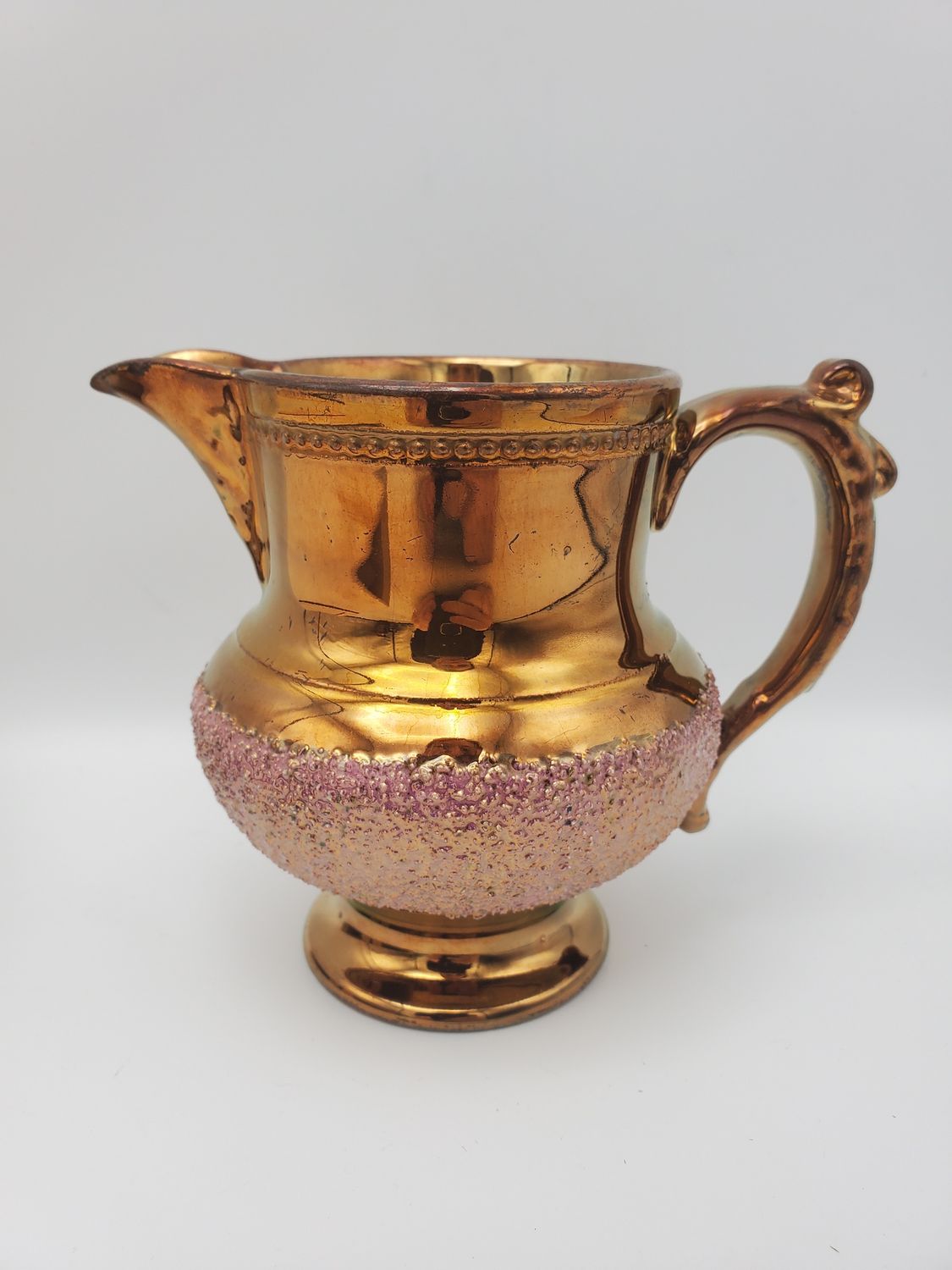 Copper lustre antique pink sand band creamer