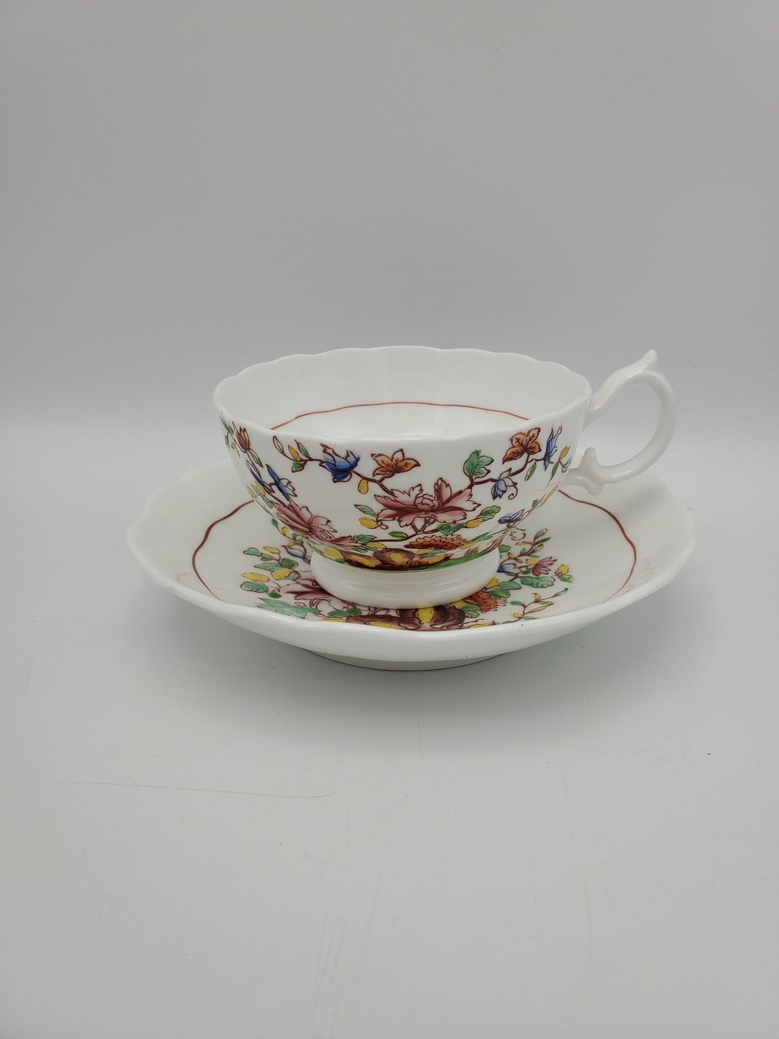 White with flowers teacup