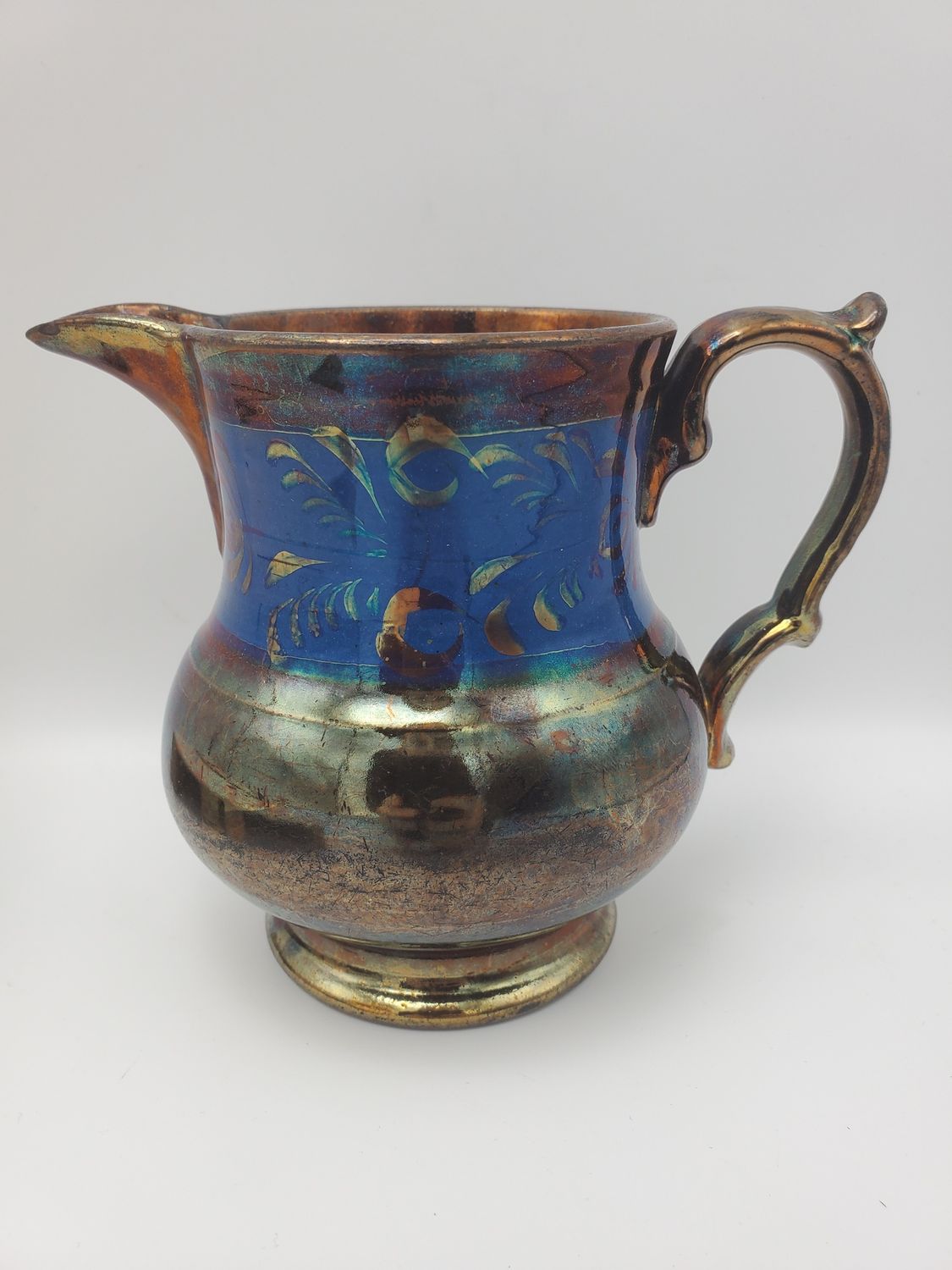 Coppwr antique lustre dark blue band floral creamer