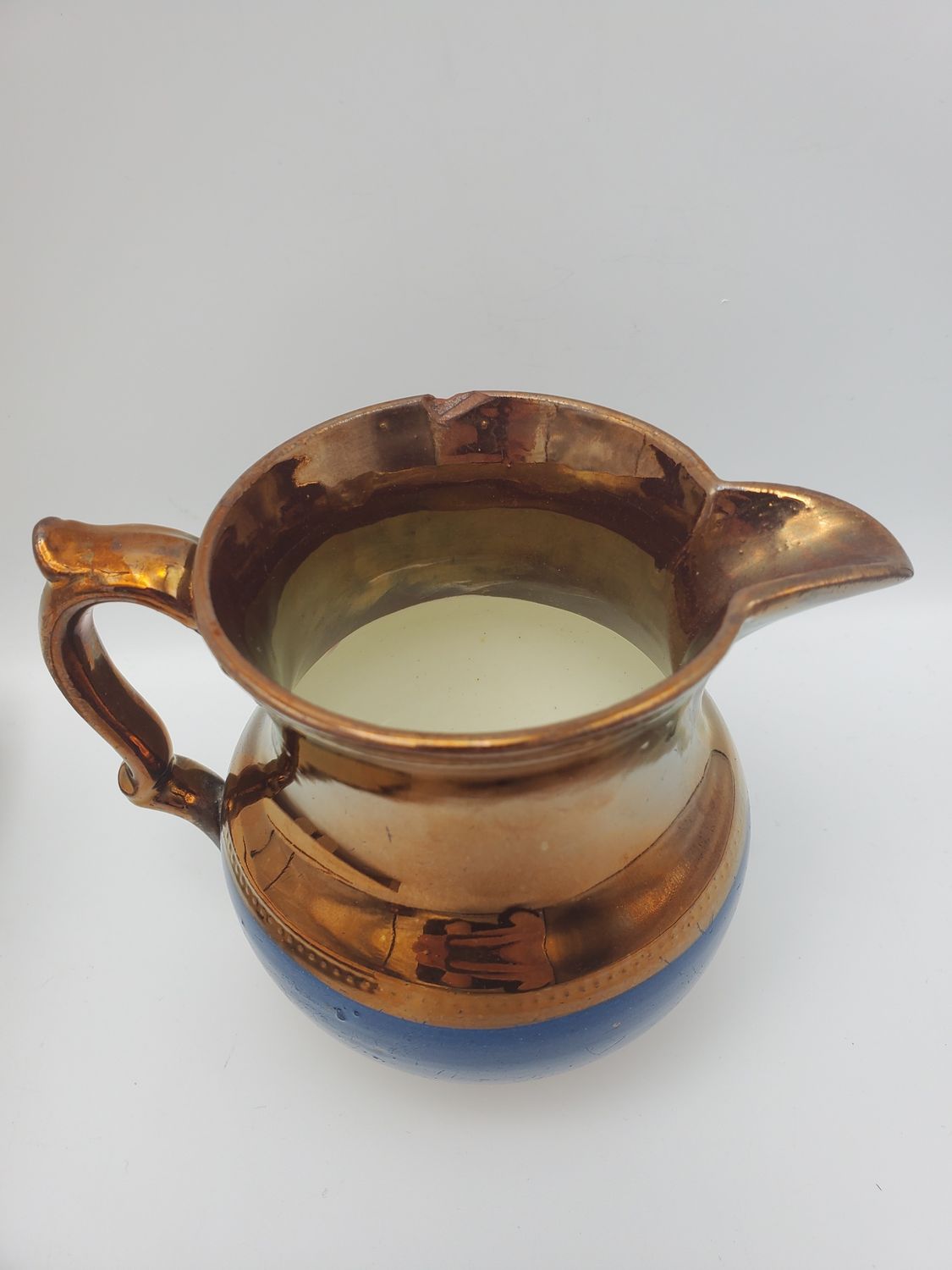 Copper Lustre Antique Blue Band Bottom Creamer