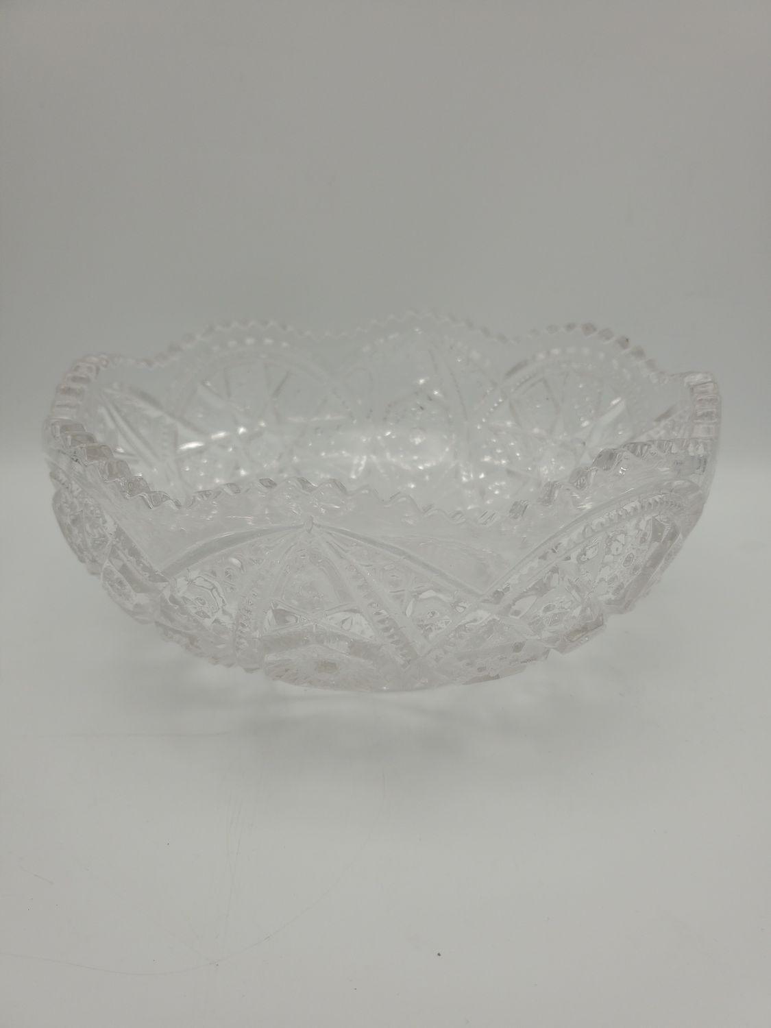 Scalloped sawtooth cut crystal bowl