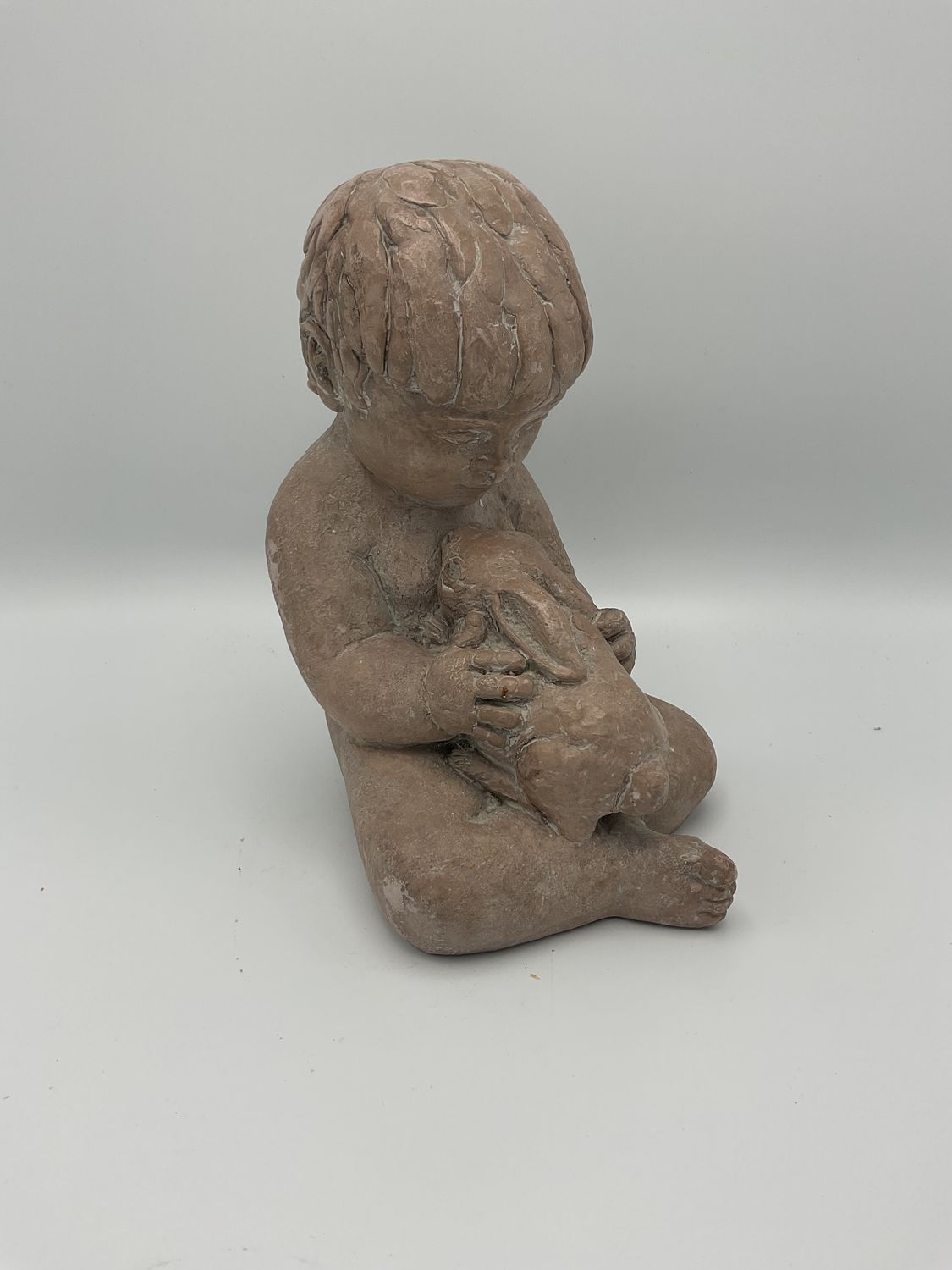 Child Holding Bunny Vintage Sculpture
