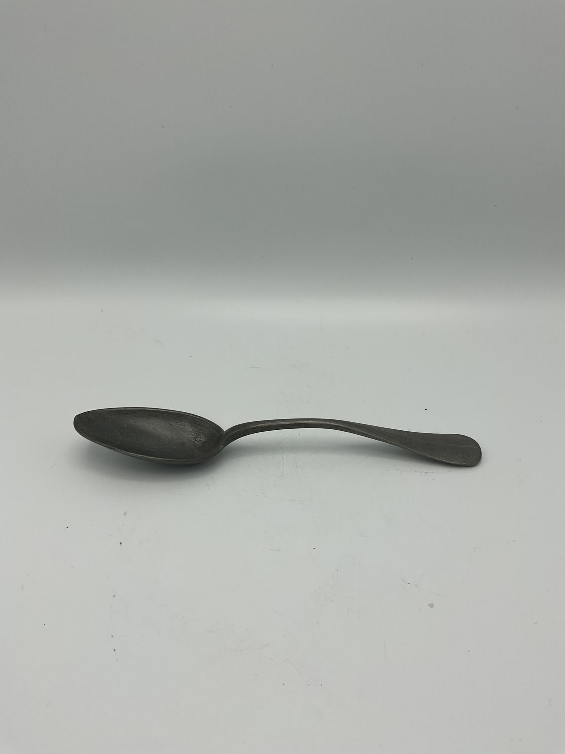 Antique Blackened Metal Spoon