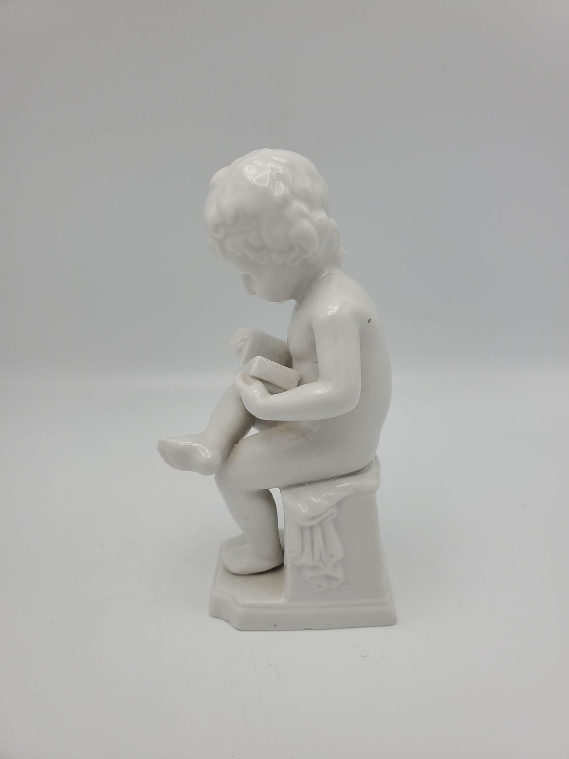 Boy Reading Porcelain Statue