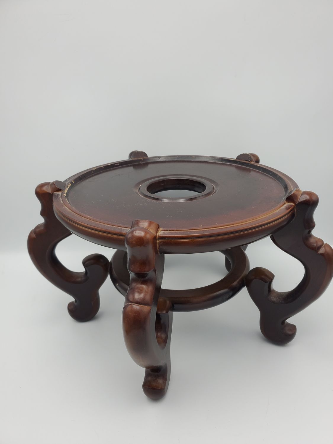 Carved wood plant stand