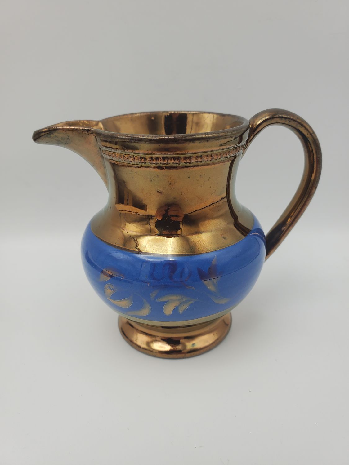 Copper Lustre Blue Leaves Band Creamer