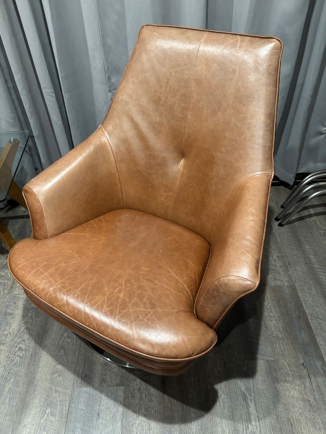Brown Leather Swvl Lounge Chairs