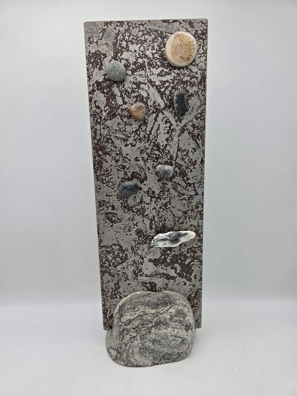 Magnetic Rocks on Metal Panel