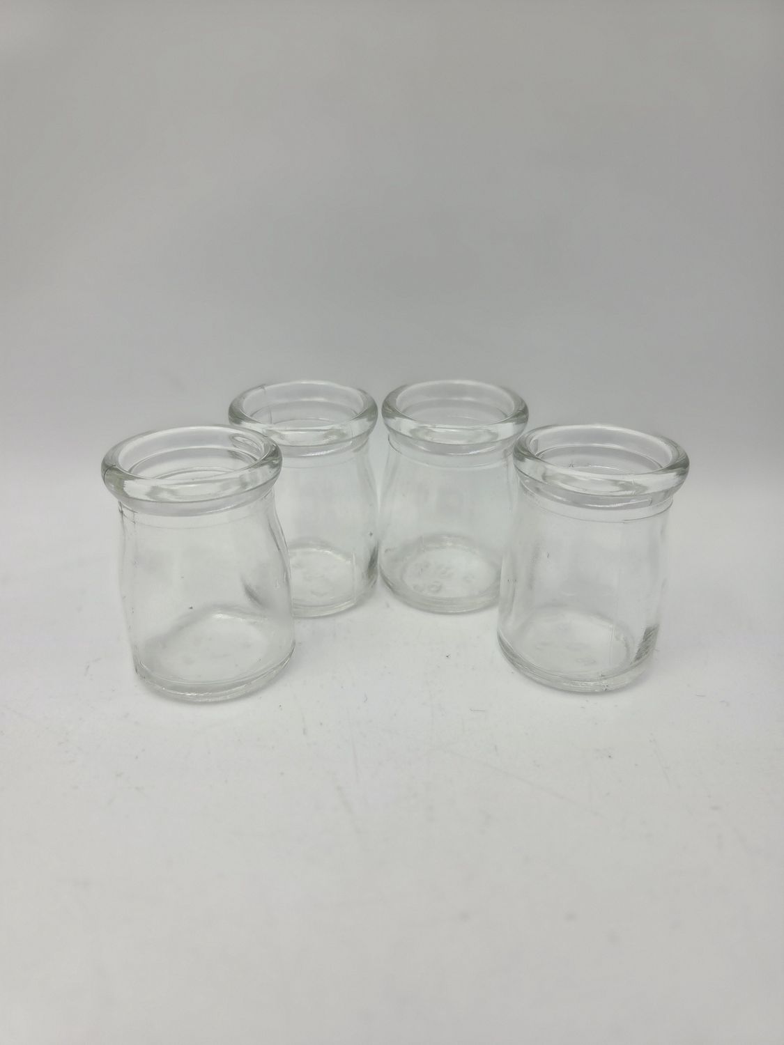 Set of 4 Small Clear Glass Mini Jars