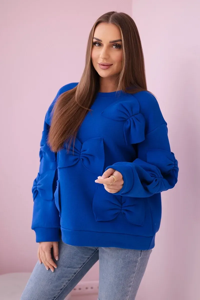 Bluza ocieplana ze ściągaczem i ozdobnymi kokardami - chabrowa