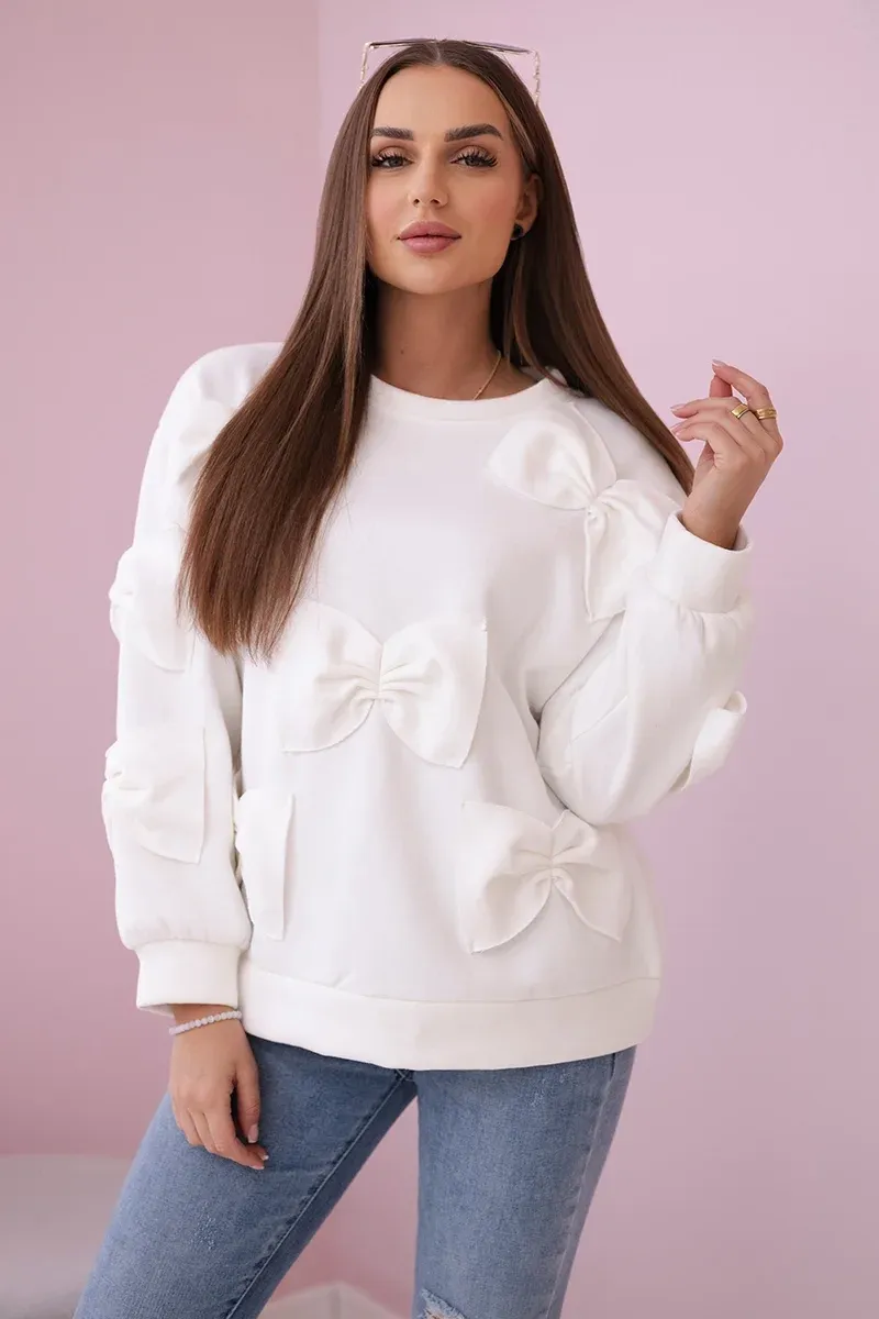 Bluza ocieplana z ozdobnymi kokardami - ecru i różowy neon