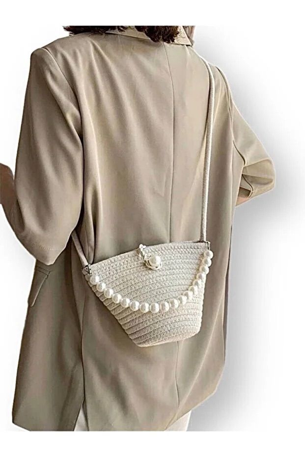 white shoulder bag with pearl handbag