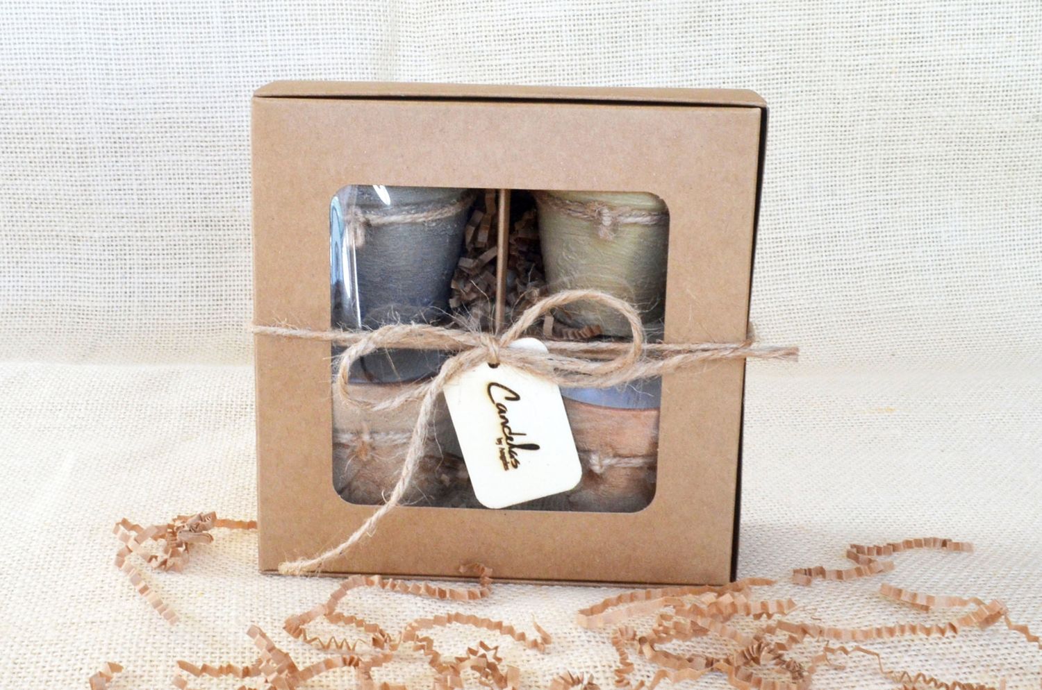 Gift set of 4 hand-painted terracotta candles, made with a soy–coconut wax blend (3 oz each). Available in 13 fragrances/colors, elegantly packaged for a thoughtful, tasteful gift.