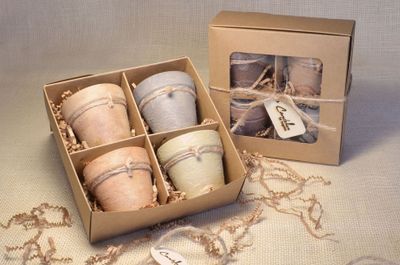 Gift set of 4 hand-painted terracotta candles, made with a soy–coconut wax blend (3 oz each). Available in 13 fragrances/colors, gracefully packaged for a thoughtful, tasteful gift.