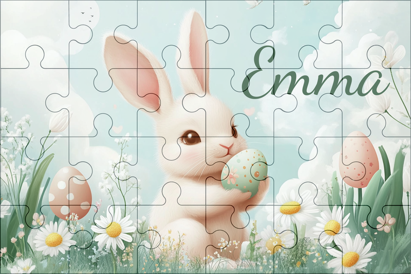  Kinderpuzzel met een wit konijntje en naam, omringd door lente-bloemen en paaseieren.