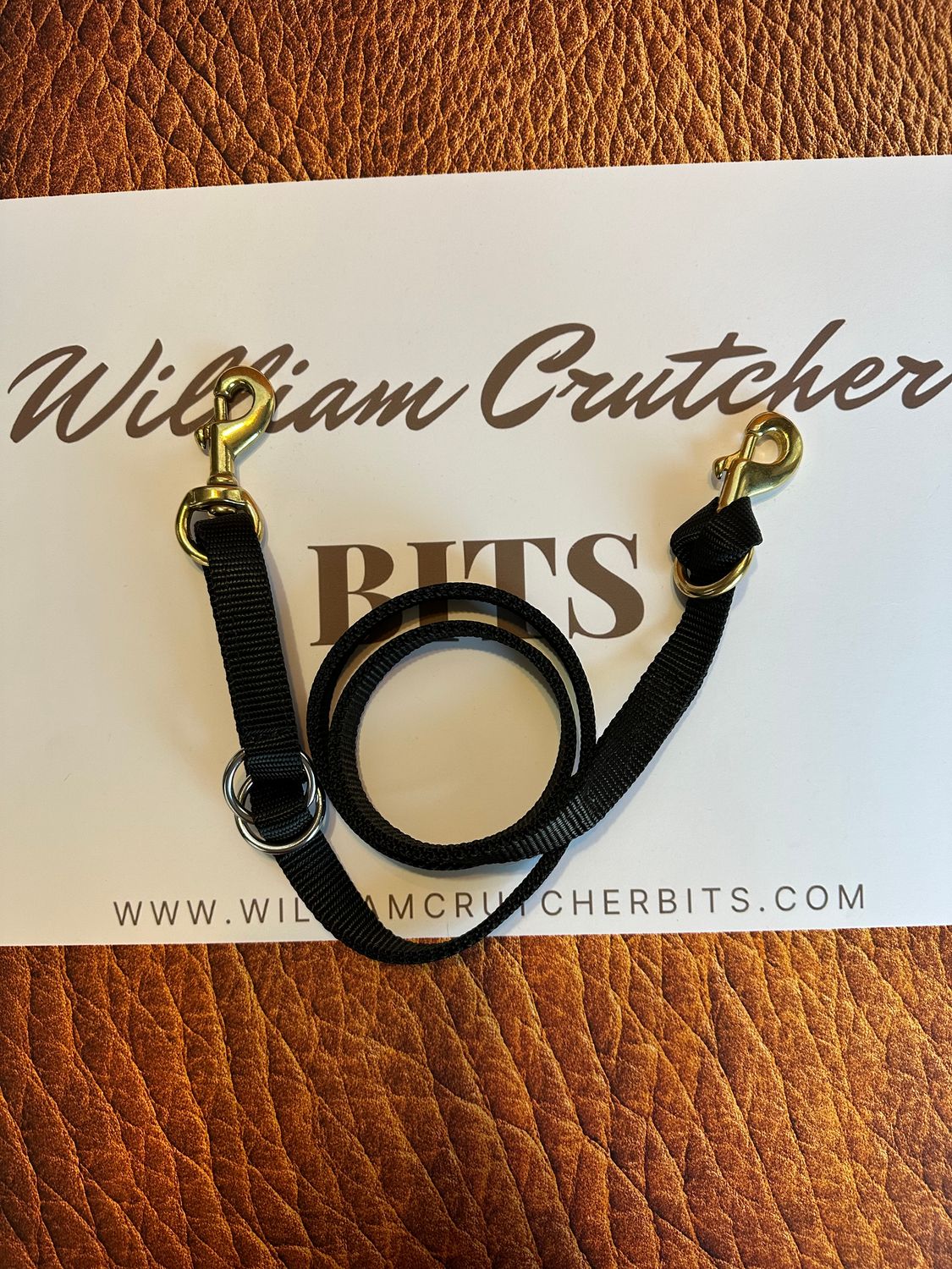 #330 nylon tiedown strap w/ stainless steel rings for adjustment *black only