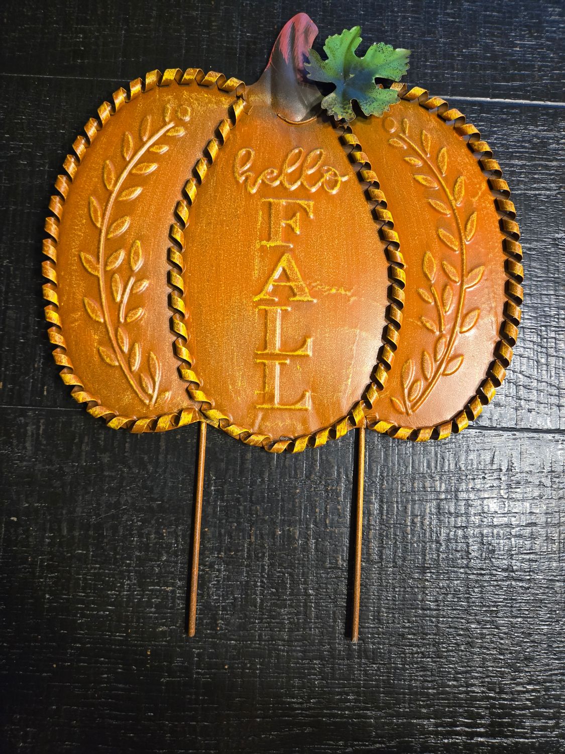 Pumpkin yard décor. (Hello Fall with green leaf and spiral around pumpkin)