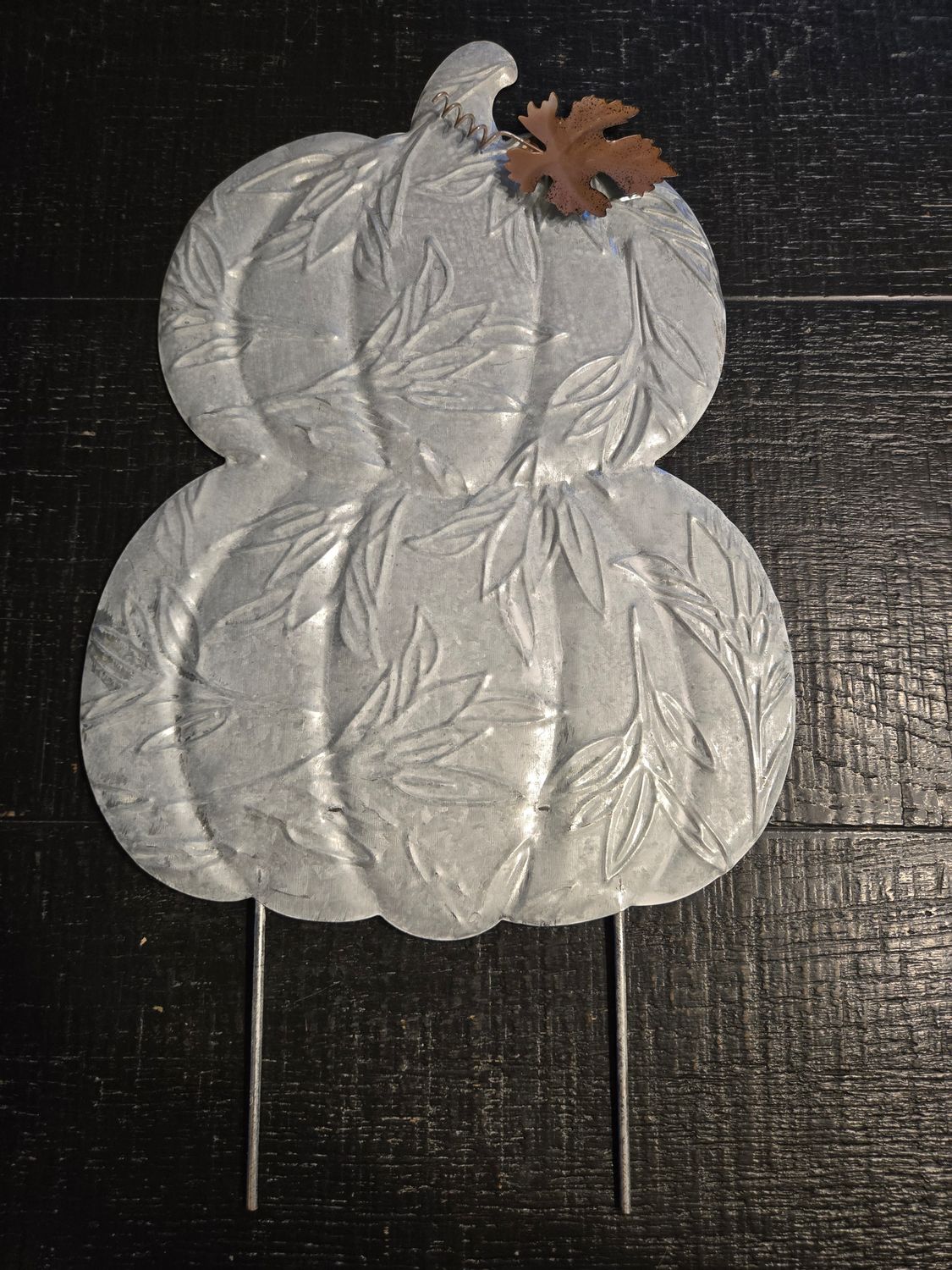 Pumpkin yard décor. ( Silver double pumpkin, a Brown leaf)