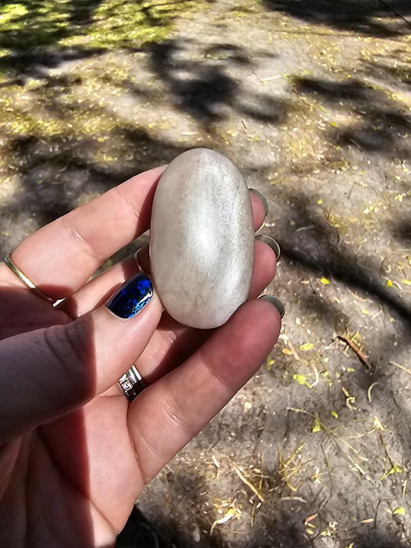 Black moonstone palm stone
