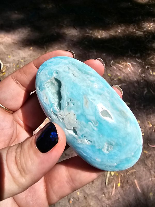 Aragonite palm stone