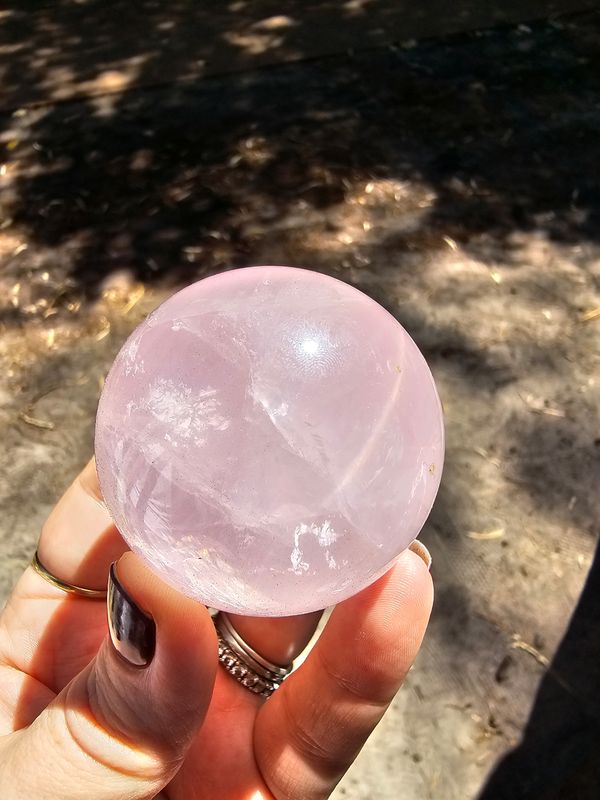 Rose quartz sphere with star