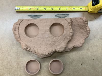 Plateforme à ventouse avec contenants doubles.