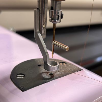 Needle magnet to align front of needle 